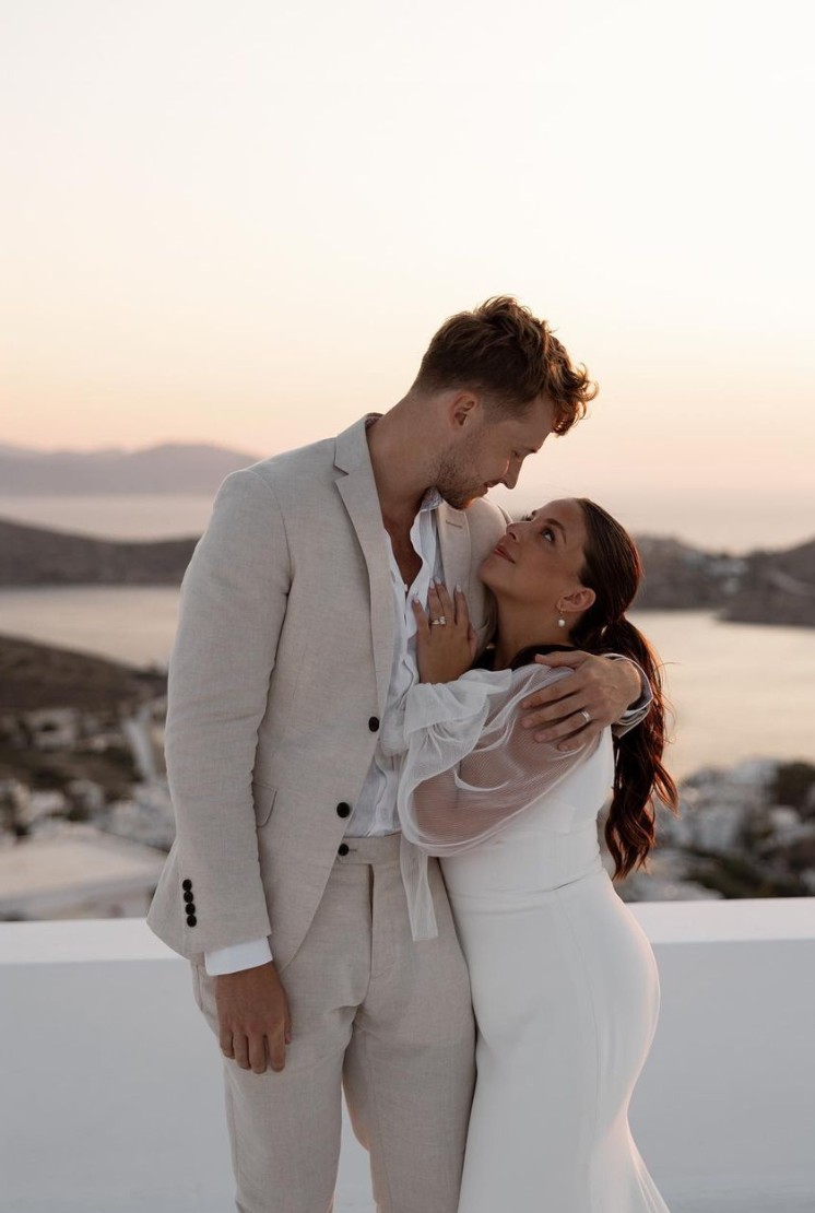 Winnipeg influencer Nicole Zajac and her husband Brett Anderson at their destination wedding in Sicily, with Brett wearing a custom suit by Eph Apparel.