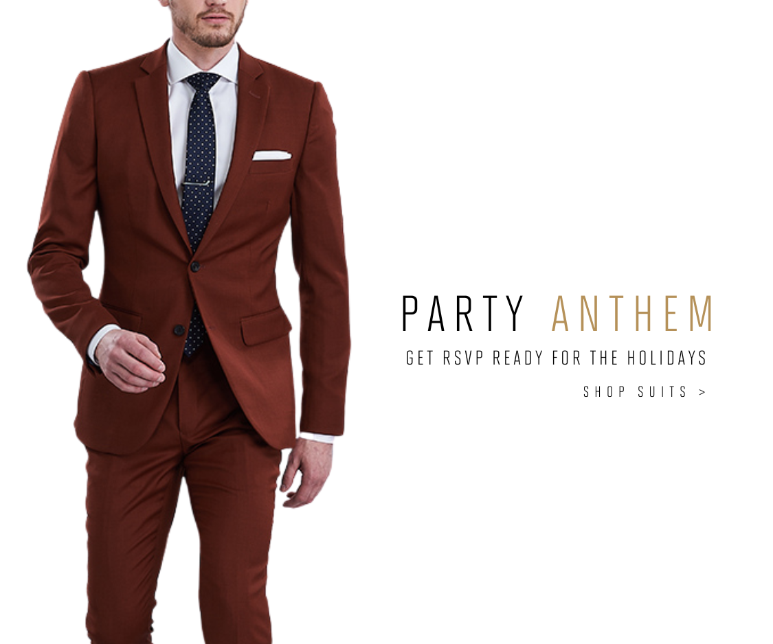 Man in a rust-colored suit, ready for holiday festivities.